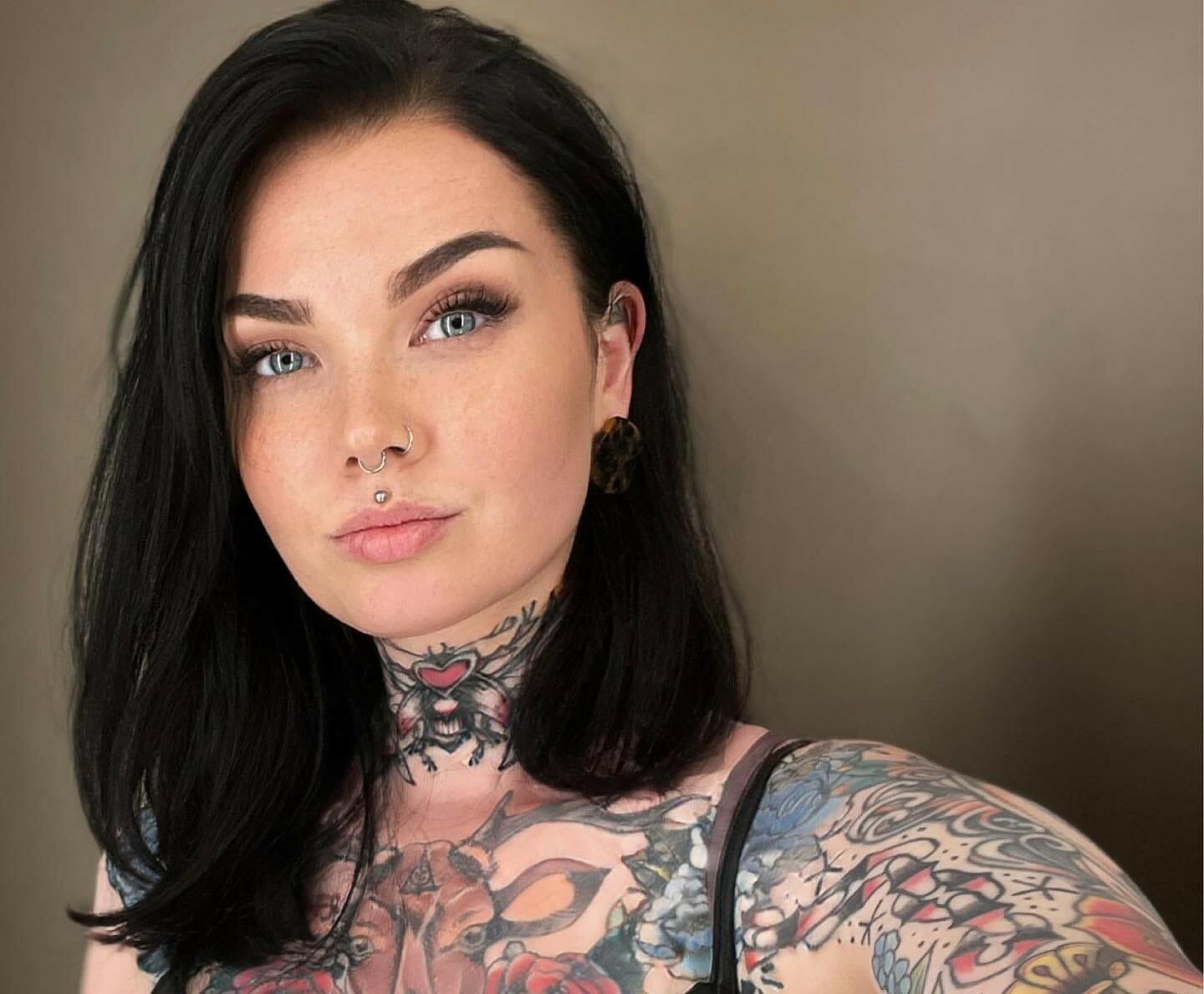 11 Throat Female Neck Tattoo Ideas That Will Blow Your Mind