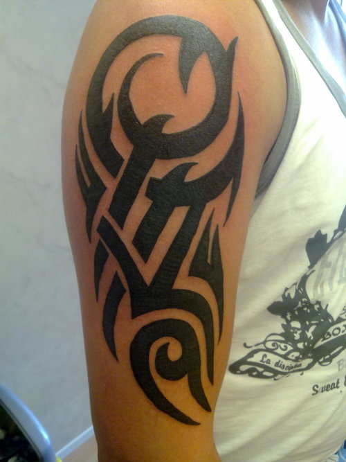 13 Awesome Tribal Arm Tattoos Designs