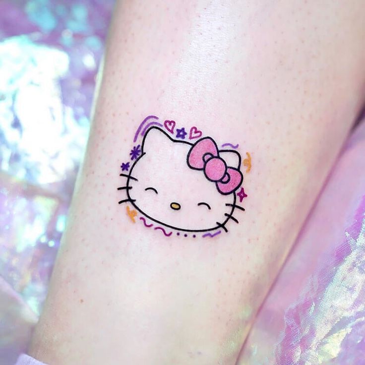 15 Cute Amp Lovely Hello Kitty Tattoo Designs