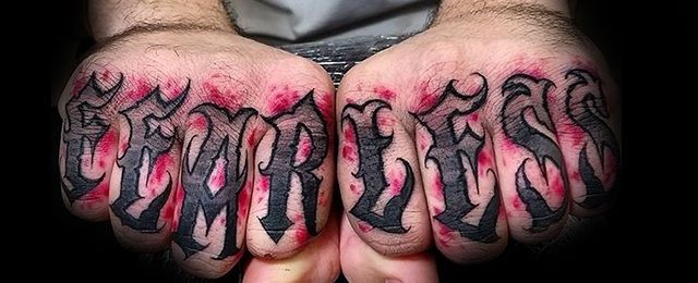 20 Fearless Tattoo Designs For Men Powerful Word Ink Ideas Fearless