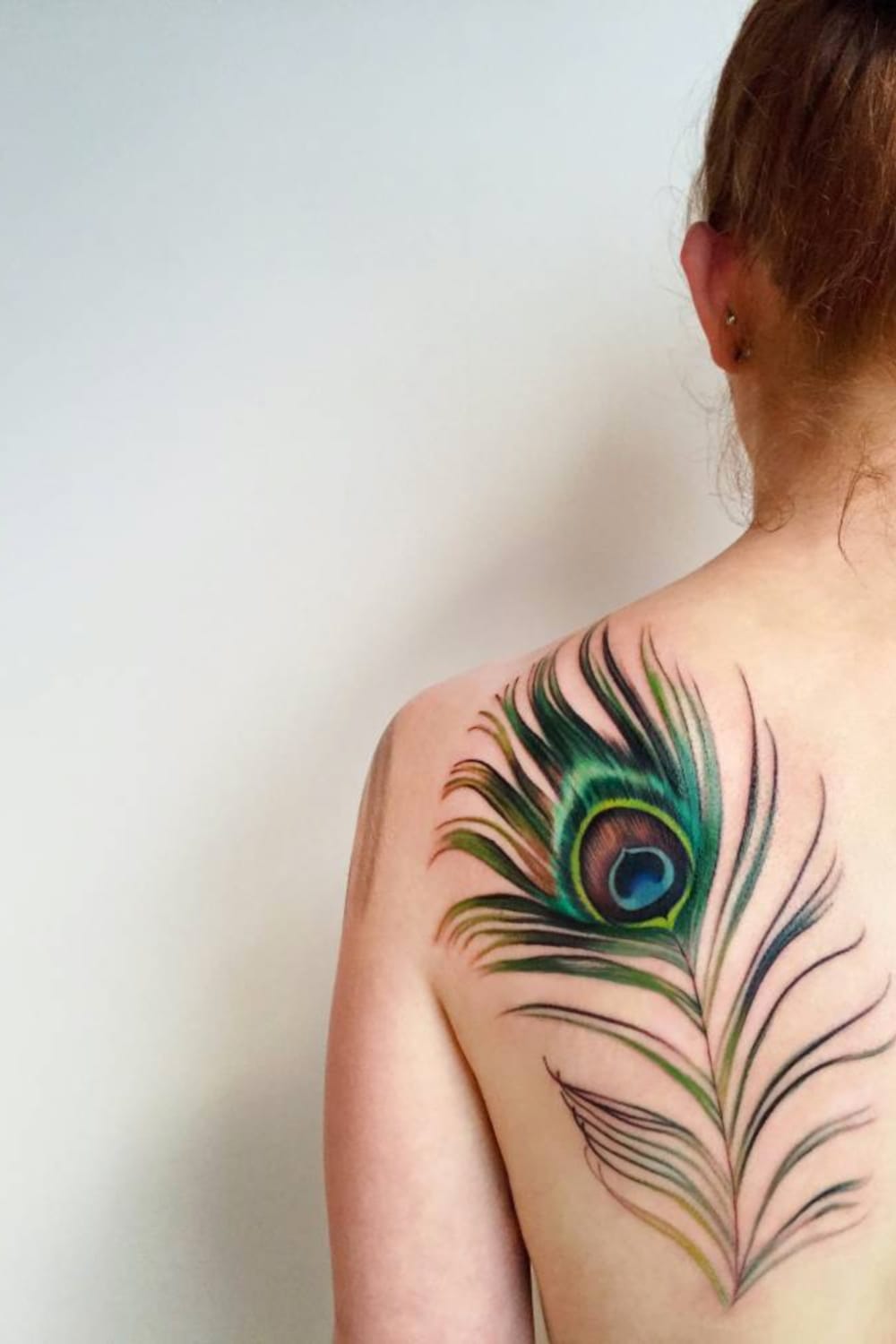 30 Amazing Feather Tattoo Ideas With Meaning