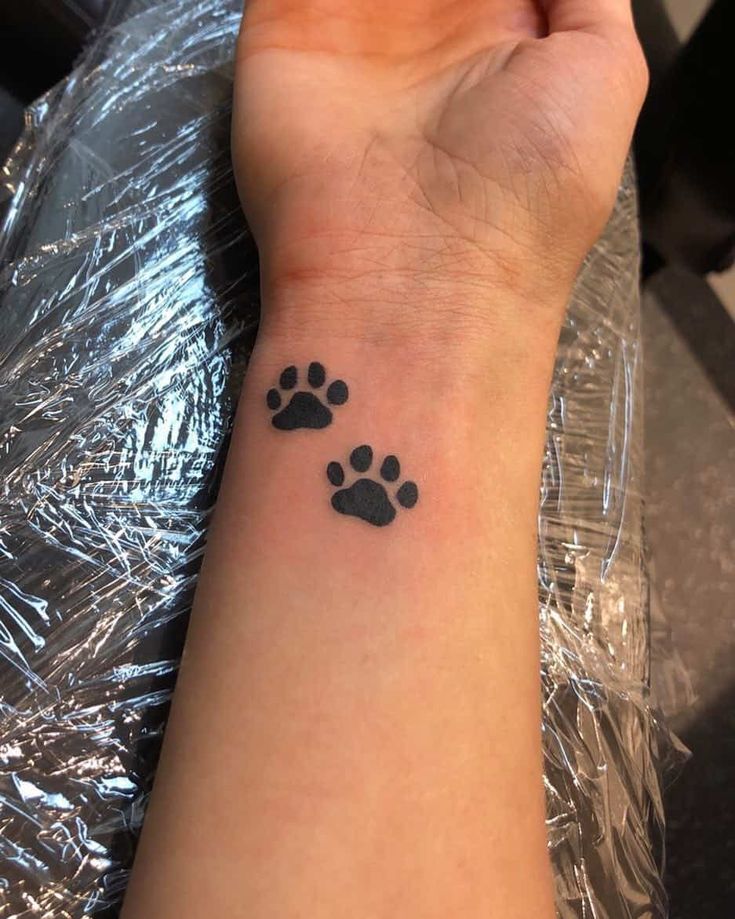 30 Best Dog Paw Tattoo Meanings And Designs Dog Paw Tattoo Paw