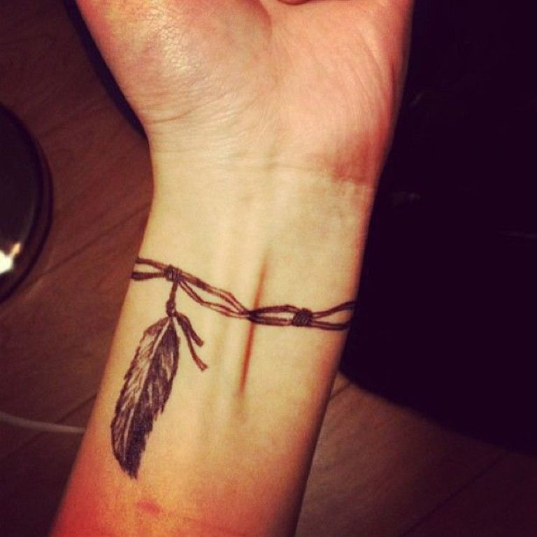 57 Attractive Wrist Feather Tattoos