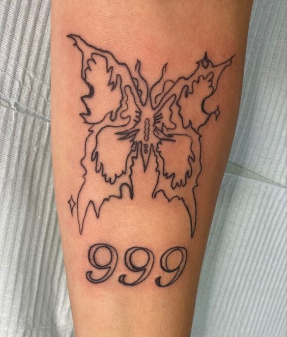 999 Tattoo Makes A Symbol Of Shocking Positivity Push