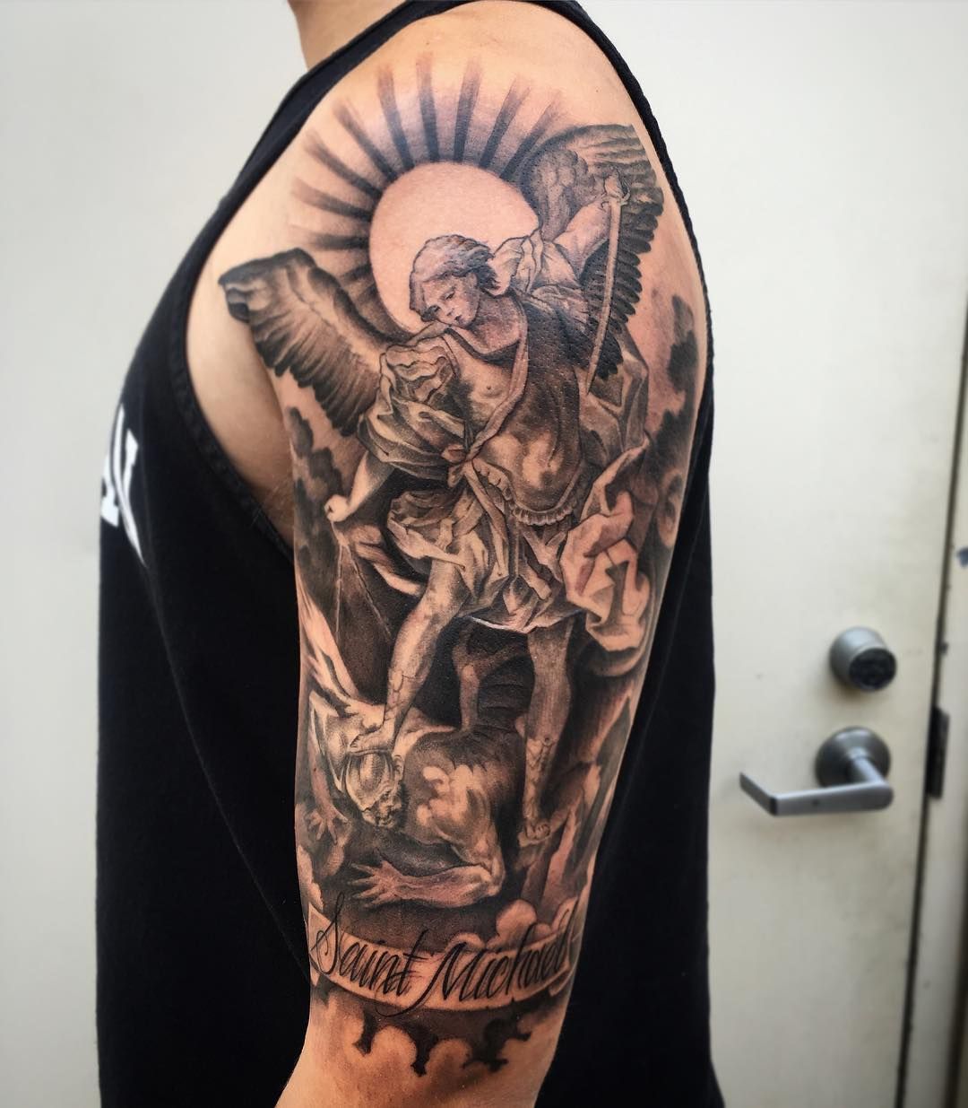 Archangel Michael Tattoo Located On The Forearm Black