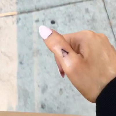 5 Meanings Behind Ariana Grande's Hand Tattoo