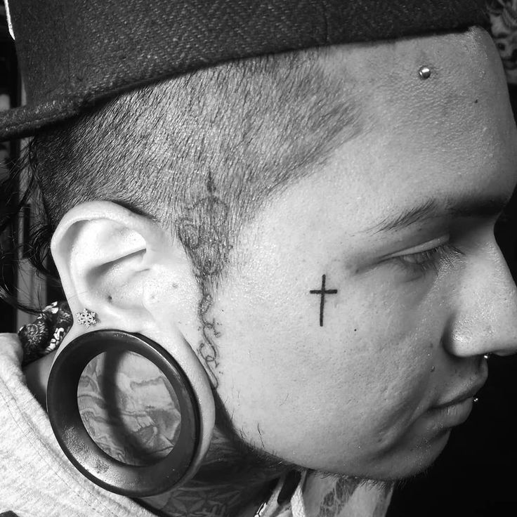 5 Face Cross Tattoo Designs to Consider