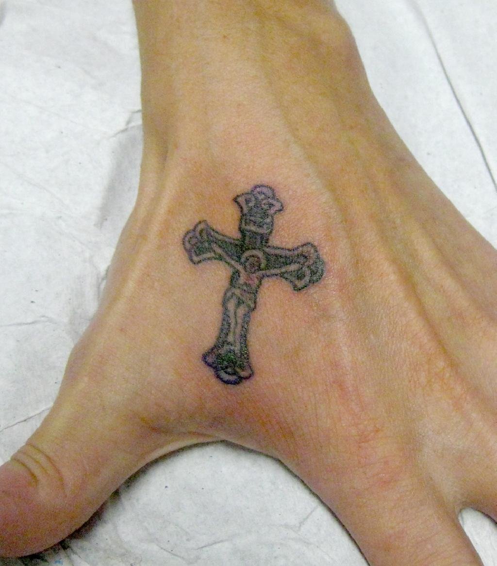 7 Cross with Ribbon Tattoo Designs You'll Love