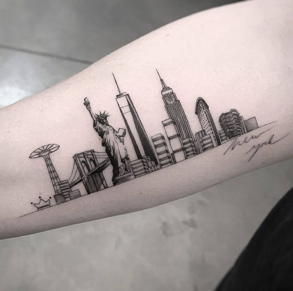 Fine Line New York City Skyline Tattoo On The Bicep