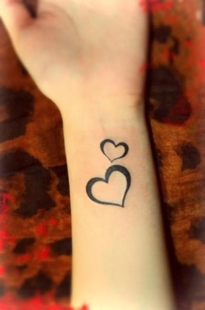 Hearts on Wrist Tattoo Meaning and Design Ideas