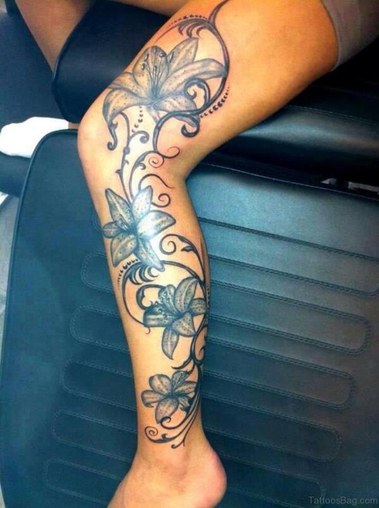 Beautiful Leg Tattoos with Delicate Floral Designs