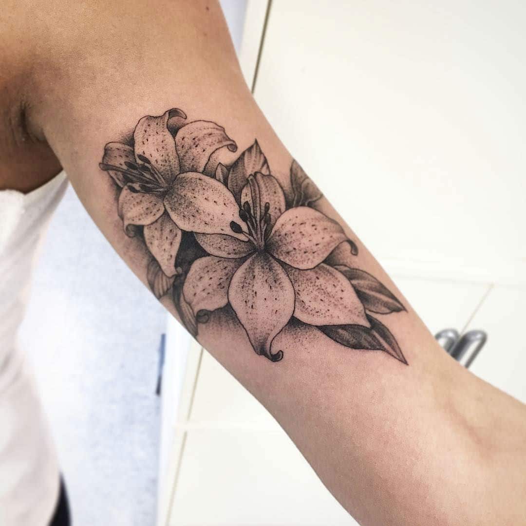 Lily Tattoo Meaning and Beautiful Design Ideas