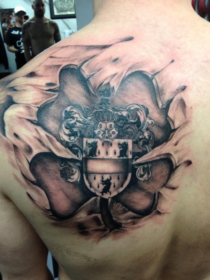 Medieval Family Crest Skin Rip Tattoo On Shoulder Blade Tattooimages Biz