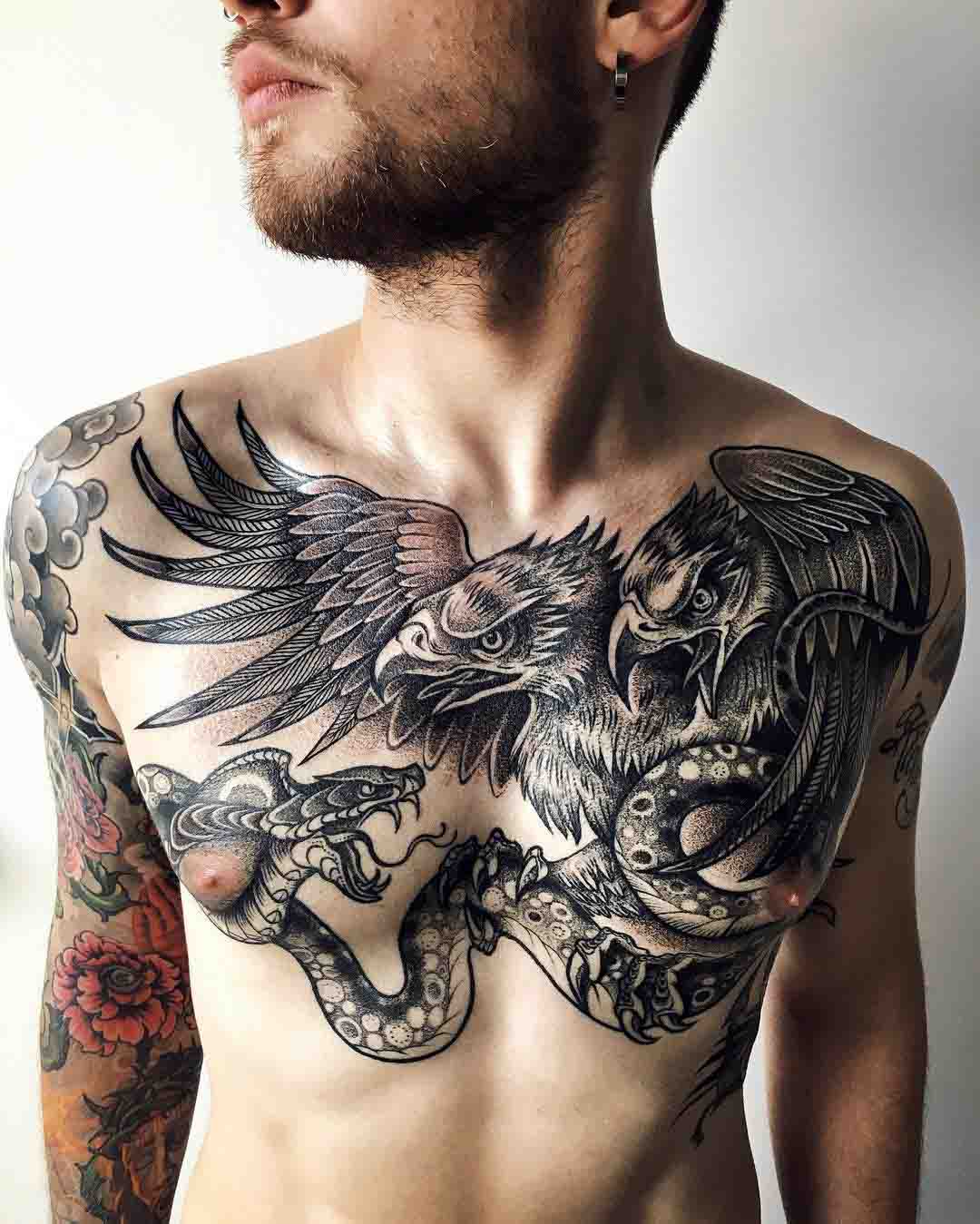 Mens Chest Tattoo Designs and Meaning Explained