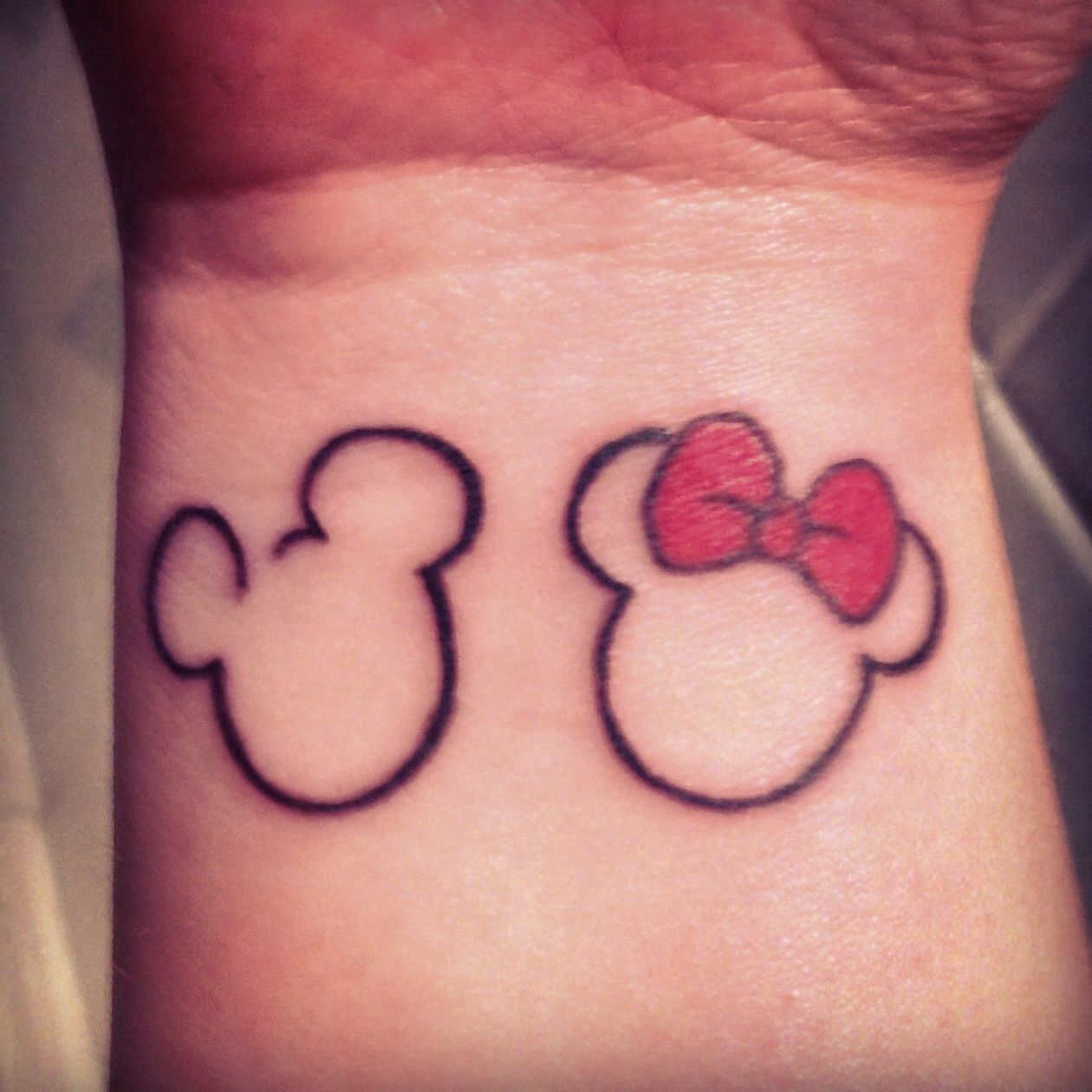 Mickey And Minnie Mouse Tattoos Kissing