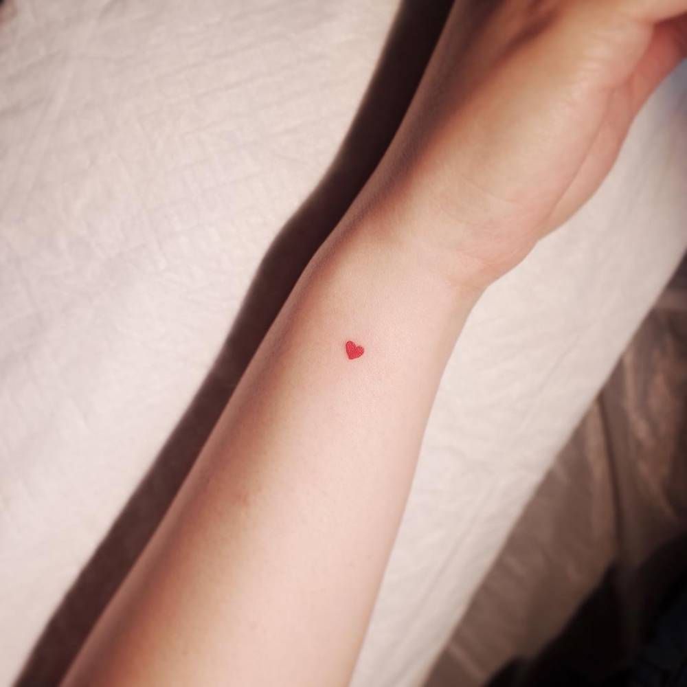 Minimalist Red Heart Tattoo On The Neck