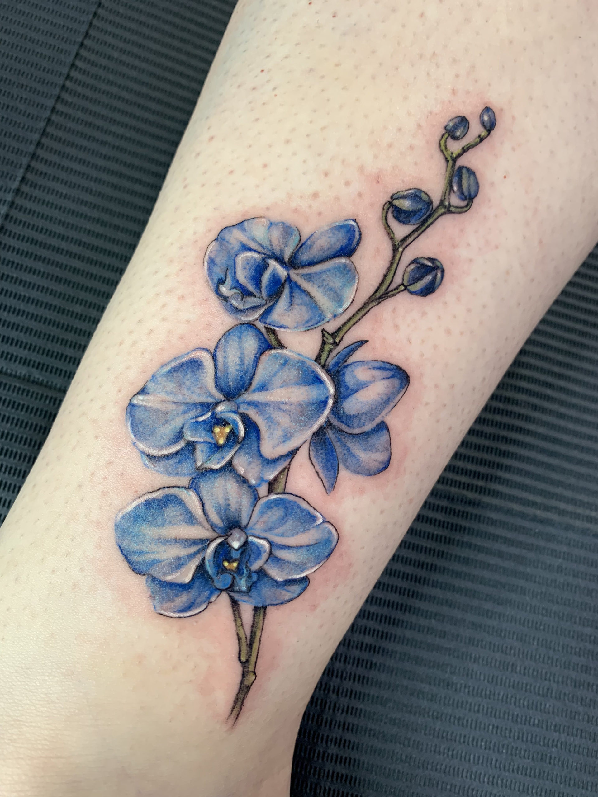 Orchid Tattoo Meaning and Designs Explained