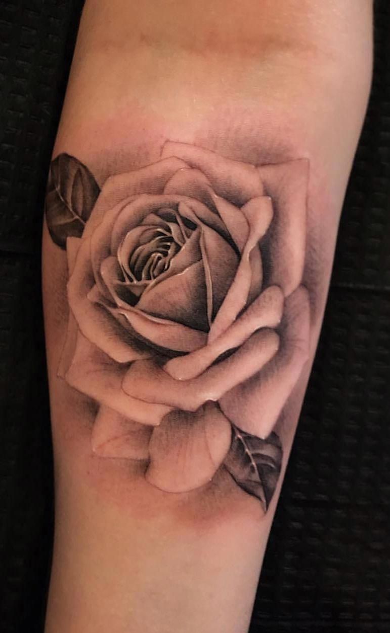 Perfect Black And Grey Rose Tattoo Inked On The Left Forearm Black