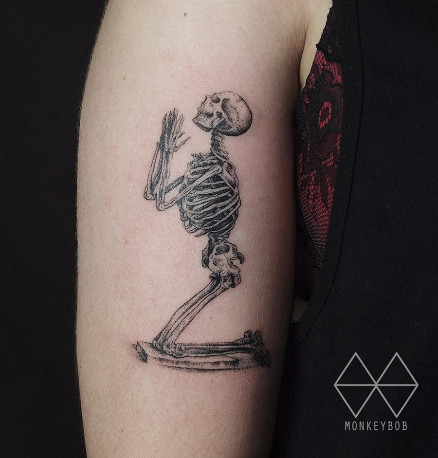 Praying Skeleton Tattoo Meaning and Designs