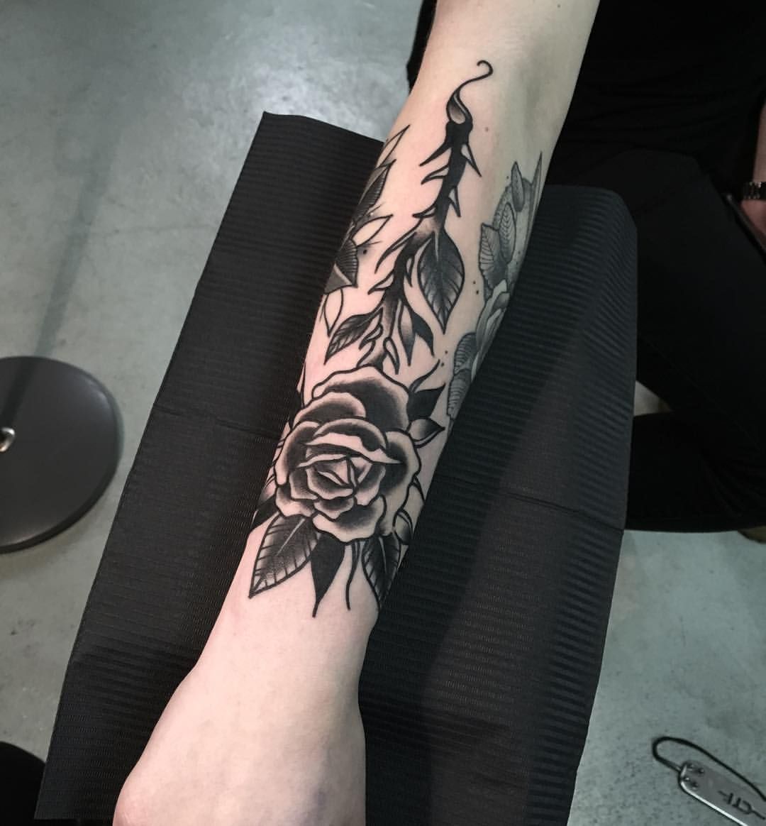 Rose With Thorns Tattoo Meaning