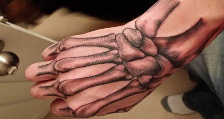 Skeleton Hand Tattoo Designs: Dark Elegance on Skin