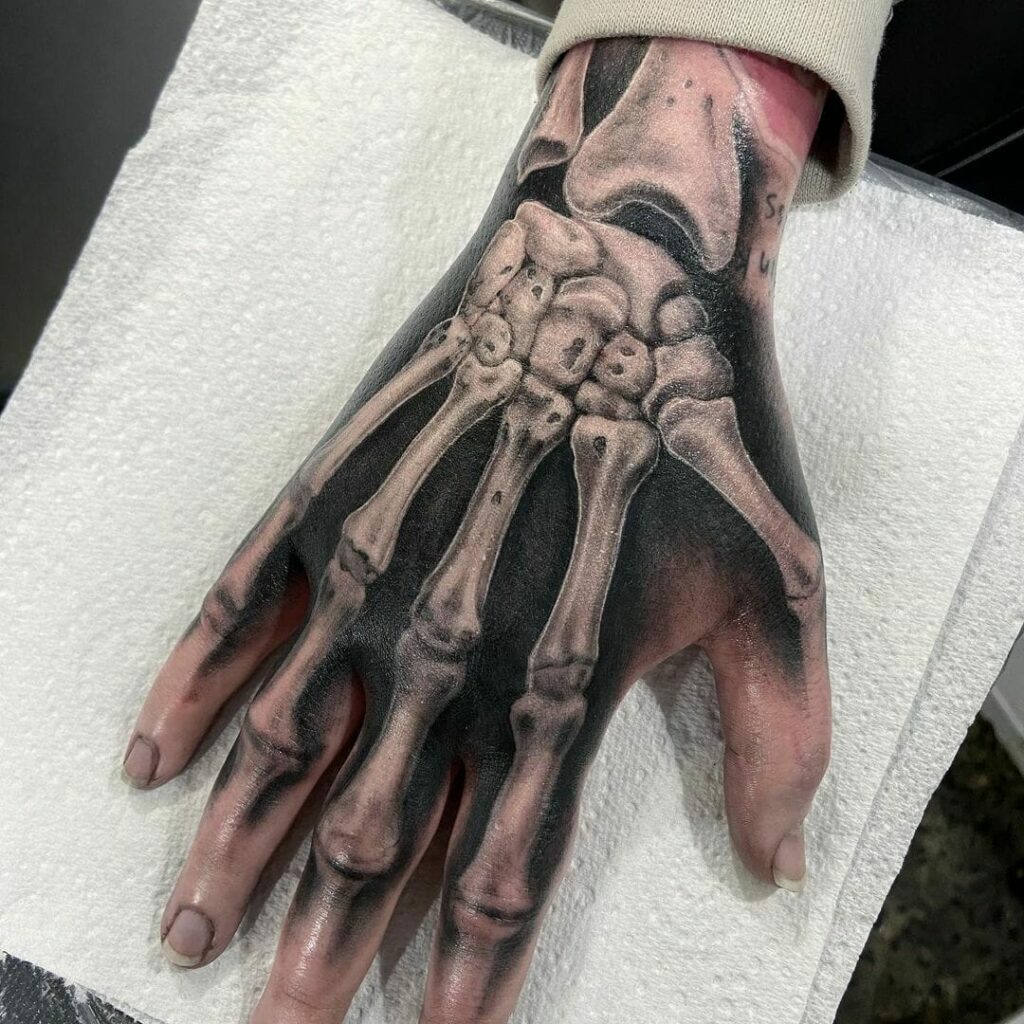 Skeleton Hand Tattoo Tattoo Ideas And Inspiration Skeleton Hand