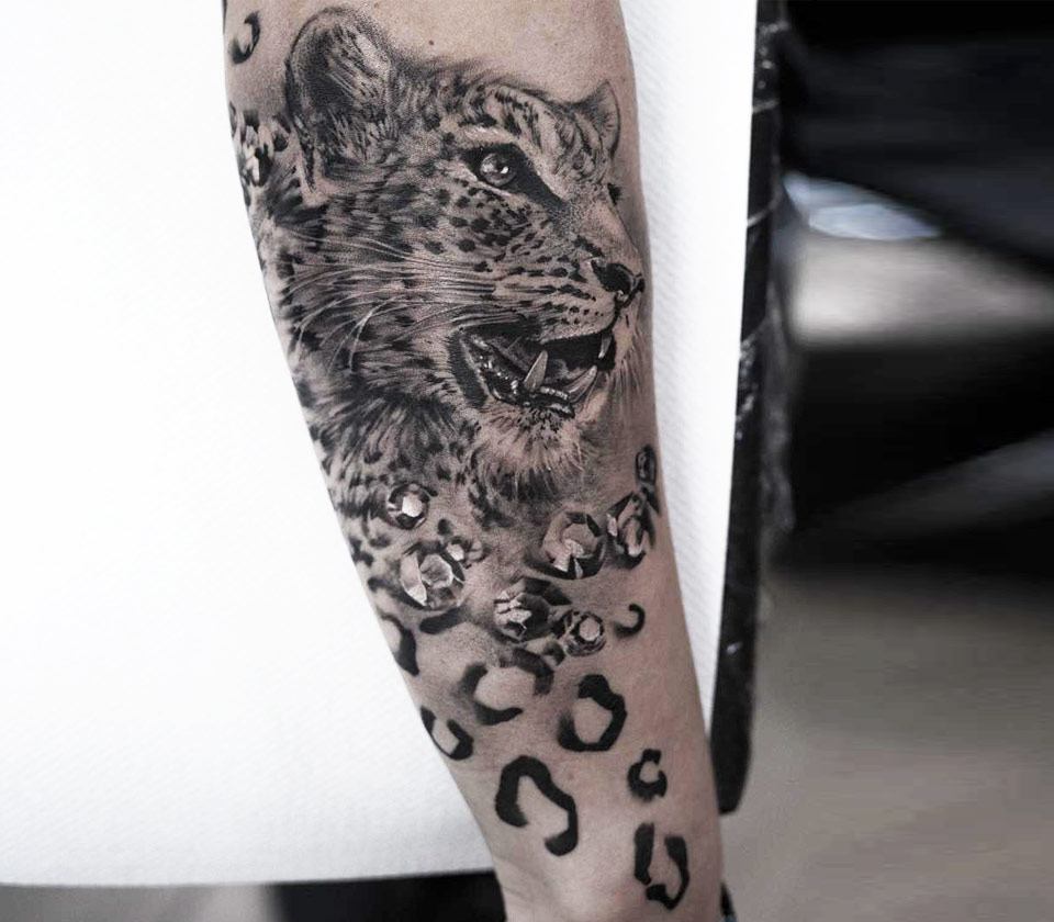 Snow Leopard Tattoo Meaning and Design Inspiration