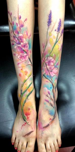 7 Beautiful Flower Tattoo Ideas for Your Leg