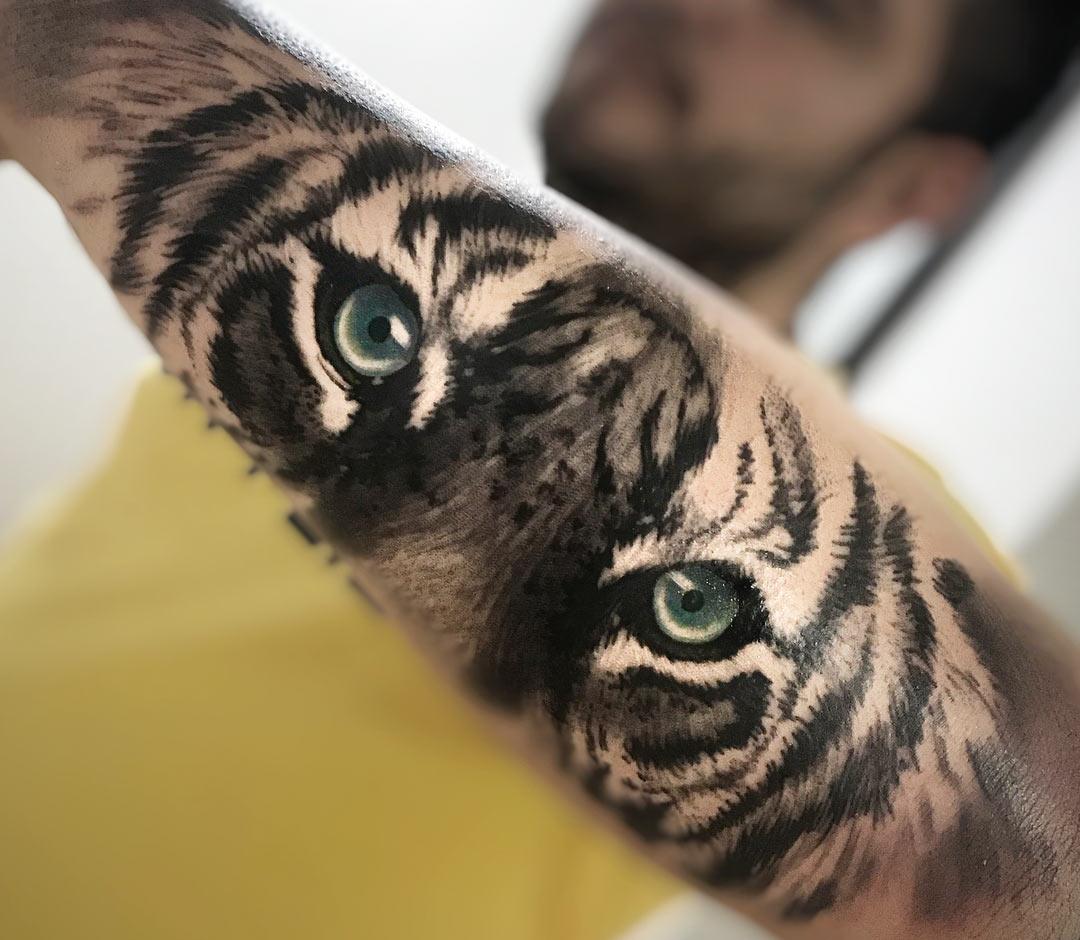 Tiger Eyes Tattoo By Daniel Bedoya Wolf Eye Tattoo Tiger Forearm