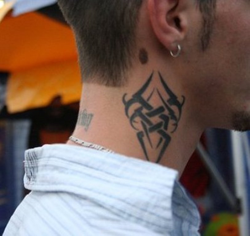 8 Tribal Neck Tattoo Designs for a Bold Statement