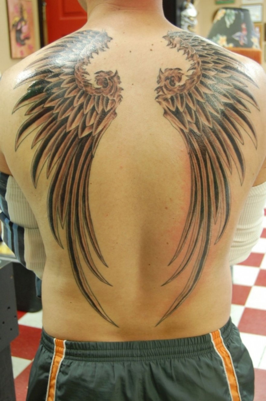 7 Stunning Ways to Wear Wings on Your Back Tattoo