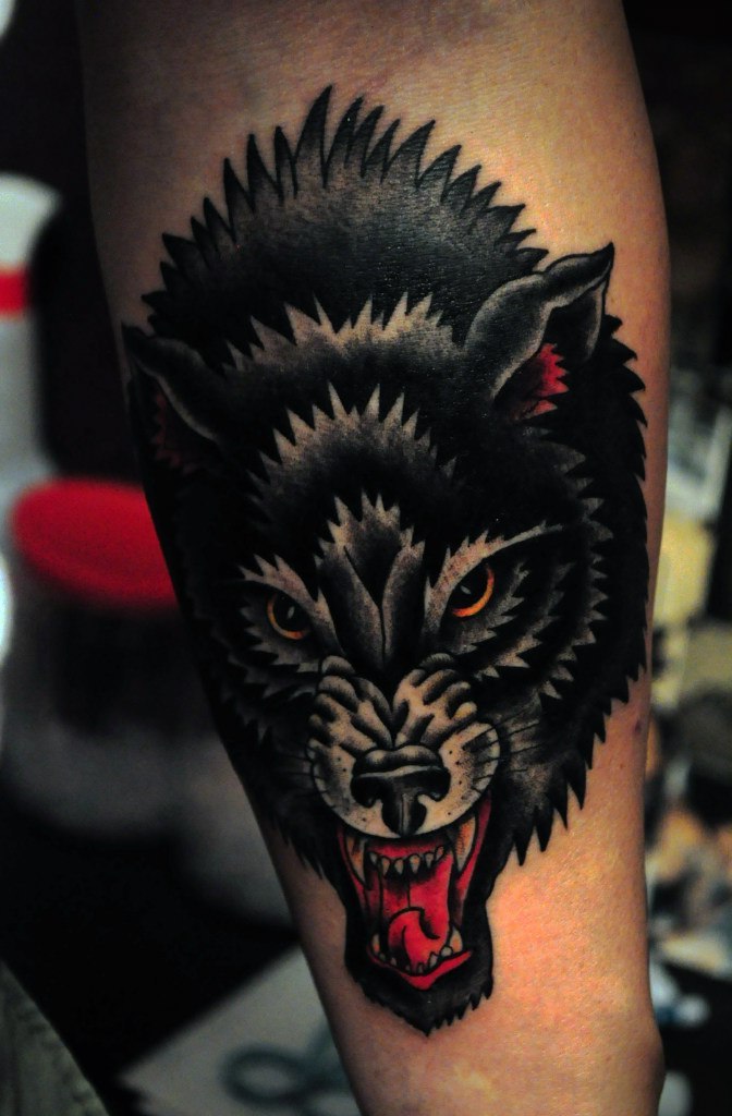 Wolf Hand Tattoo Meaning and Designs Explained