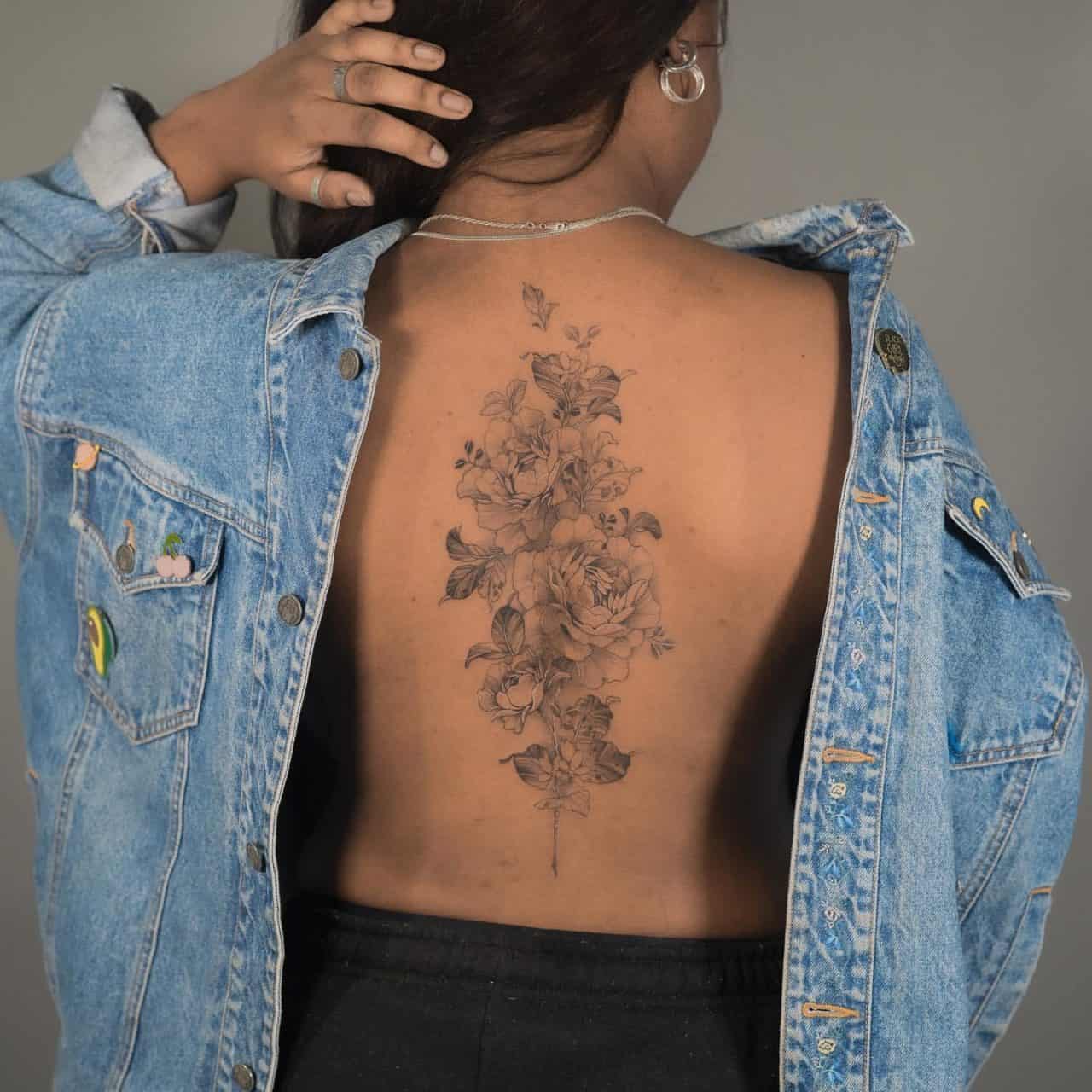 7 Beautiful Women's Spine Tattoo Ideas